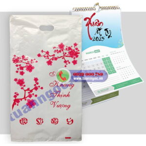 túi đựng lịch dài treo tường có in cành đào mai và chữ an khang thịnh vượng dịp tết 2026