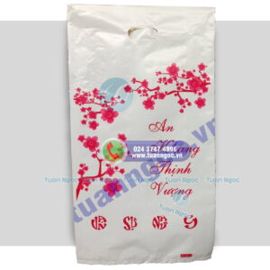 in túi đựng lịch có chữ chúc mừng năm mới và cây đào đỏ kiểu treo tường dài